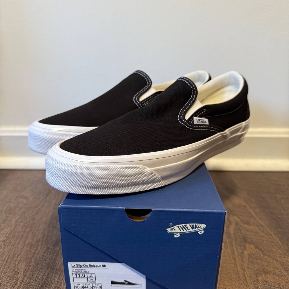 Vans Black and White Slip-On Loafers